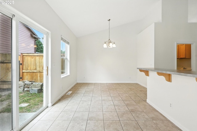 59673 Oak Ridge St, Saint Helens, OR 97051 - unfurnished dining area featuring a chandelier, light tile patterned floors, and high vaulted ceiling
