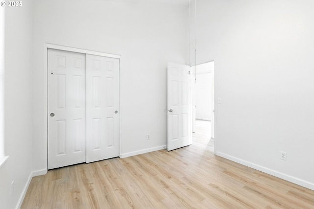 59673 Oak Ridge St, Saint Helens, OR 97051 - unfurnished bedroom featuring light wood-style flooring and a closet