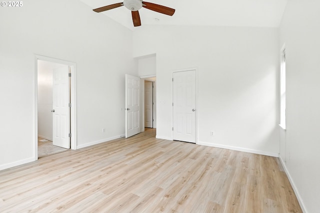 59673 Oak Ridge St, Saint Helens, OR 97051 - unfurnished bedroom featuring light wood-type flooring, high vaulted ceiling, ceiling fan, and ensuite bath