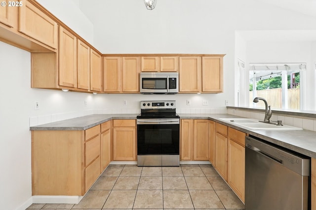 59673 Oak Ridge St, Saint Helens, OR 97051 - kitchen with appliances with stainless steel finishes, light brown cabinets, and light tile patterned floors