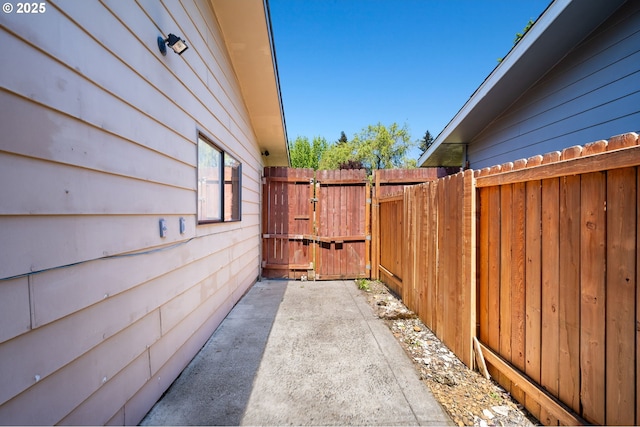 view of home's exterior with fence