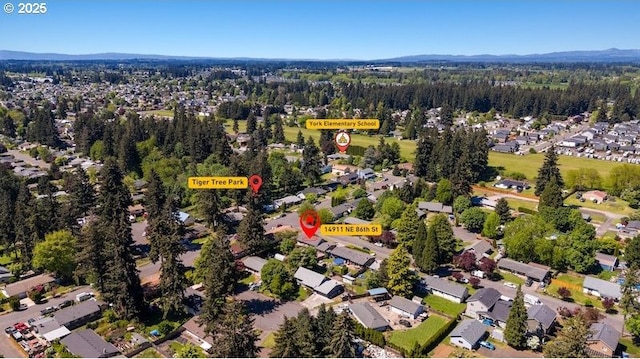 aerial overview of property's location featuring nearby suburban area