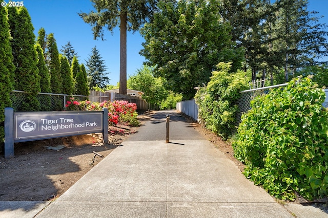 surrounding community featuring fence