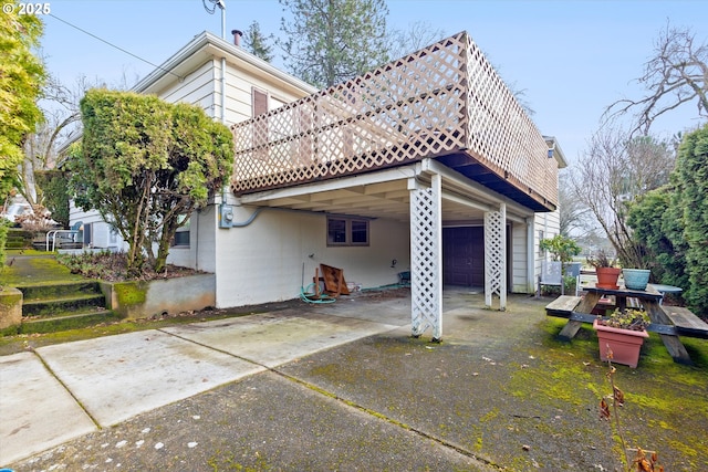 view of property exterior featuring a garage