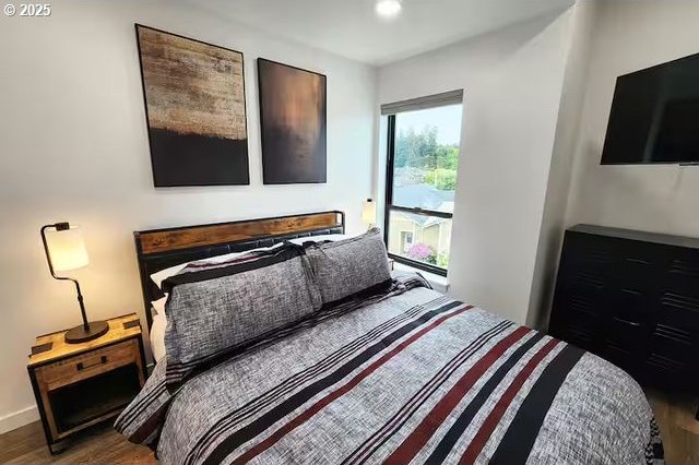 280 NW Huckleberry St, Waldport, OR 97394 - bedroom featuring wood finished floors
