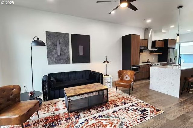 280 NW Huckleberry St, Waldport, OR 97394 - living area featuring light wood-style floors, ceiling fan, and recessed lighting