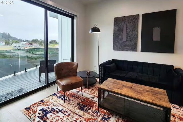 280 NW Huckleberry St, Waldport, OR 97394 - living area featuring wood finished floors