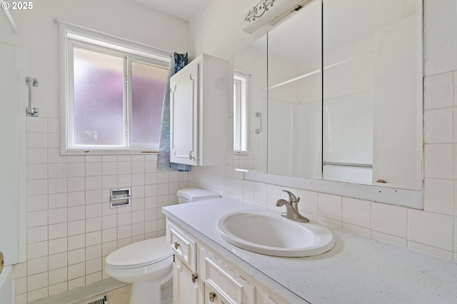 10438 NE Davis St, Portland, OR 97220 - full bathroom featuring vanity, toilet, plenty of natural light, and a shower