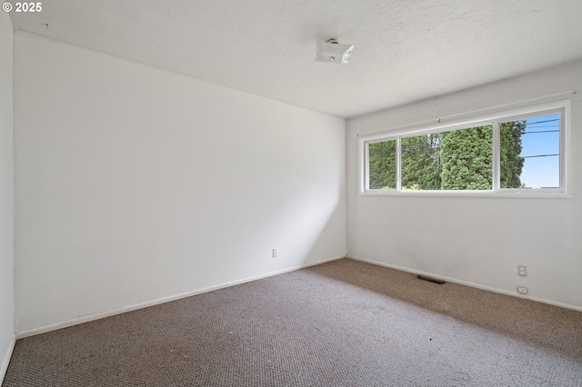 10438 NE Davis St, Portland, OR 97220 - spare room with carpet floors and baseboards