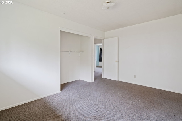 10438 NE Davis St, Portland, OR 97220 - unfurnished bedroom featuring carpet floors, a closet, and baseboards