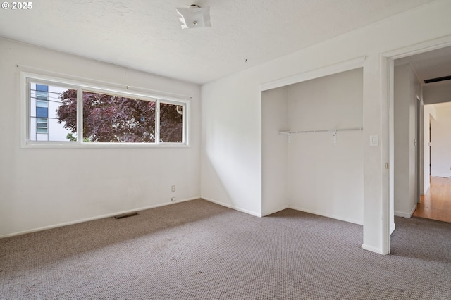 10438 NE Davis St, Portland, OR 97220 - unfurnished bedroom featuring carpet floors, a closet, and baseboards