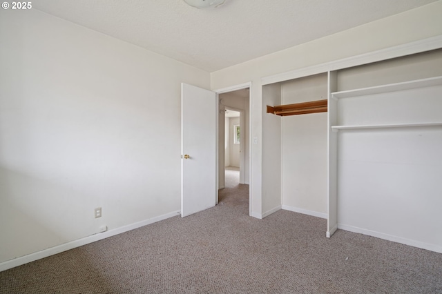 10438 NE Davis St, Portland, OR 97220 - unfurnished bedroom featuring carpet flooring, baseboards, and a closet