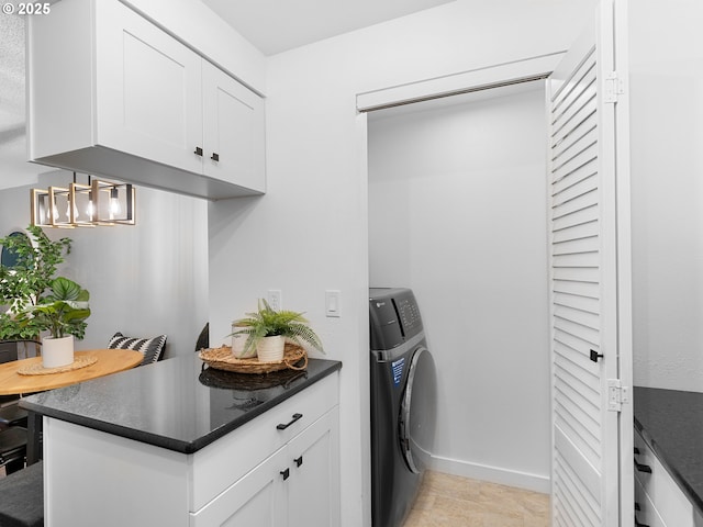 laundry room with washer / clothes dryer