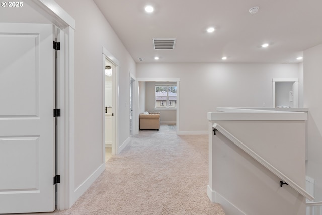 16679 SW Darwin Loop, Portland, OR 97224 - corridor with light colored carpet, recessed lighting, and baseboards
