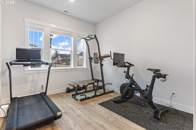 16679 SW Darwin Loop, Portland, OR 97224 - workout area with wood finished floors and baseboards