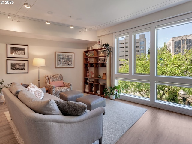 12600 SW Crescent St Unit 213, Beaverton, OR 97005 - living area featuring track lighting and wood finished floors