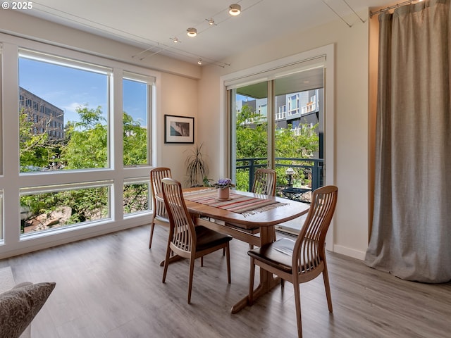 12600 SW Crescent St Unit 213, Beaverton, OR 97005 - dining room with healthy amount of natural light and wood finished floors