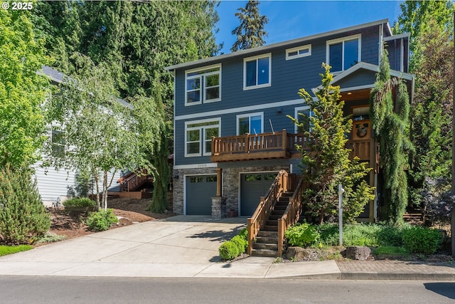35908 Chinook St, Sandy, OR 97055 - view of front facade with stairs, driveway, stone siding, and an attached garage