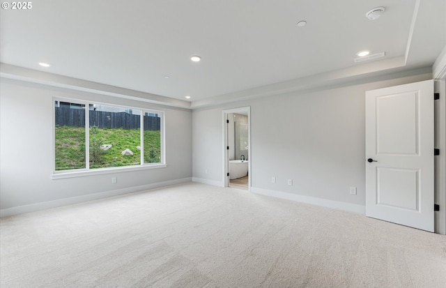 8728 S 4th Way, Ridgefield, WA 98642 - carpeted empty room featuring baseboards, a raised ceiling, and recessed lighting