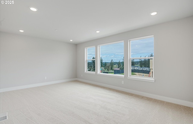 8728 S 4th Way, Ridgefield, WA 98642 - spare room featuring recessed lighting, light carpet, and baseboards