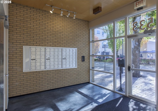 533 NE Holladay St Unit 308, Portland, OR 97232 - building lobby featuring brick wall