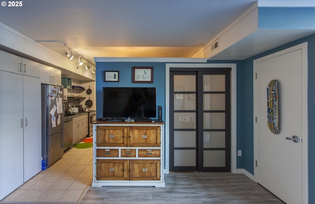 533 NE Holladay St Unit 308, Portland, OR 97232 - living room featuring light wood finished floors
