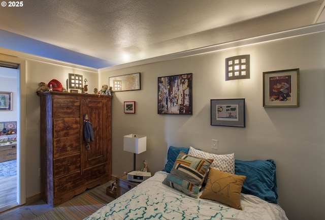 533 NE Holladay St Unit 308, Portland, OR 97232 - bedroom with a textured ceiling