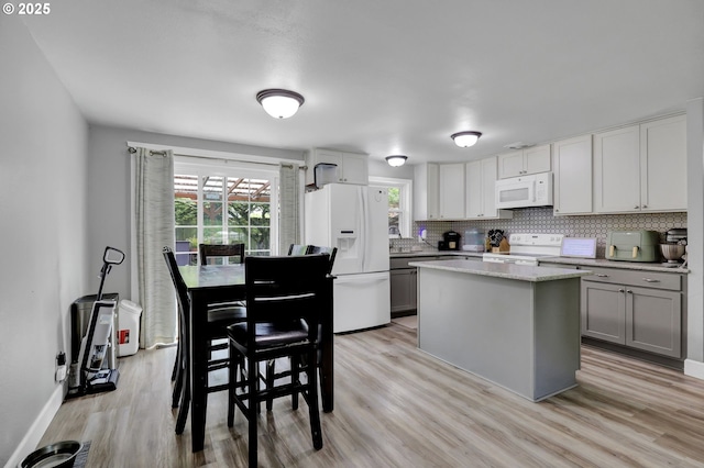 1533 Sequoia Ave, Springfield, OR 97477 - kitchen with white appliances, gray cabinetry, plenty of natural light, and light wood-style flooring