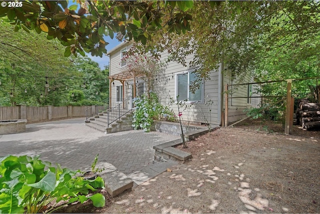 5966 Frost Ln, Lake Oswego, OR 97035 - view of front of property featuring a fenced backyard and a patio