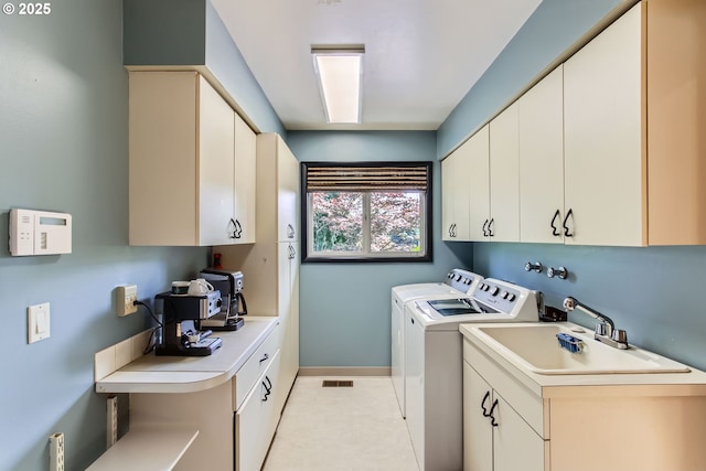 7145 SW Gable Pkwy, Portland, OR 97225 - laundry room with cabinet space and washer and clothes dryer
