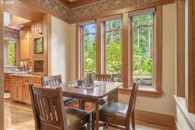 13150 SW Iron Mountain Blvd, Portland, OR 97219 - dining room featuring light wood finished floors