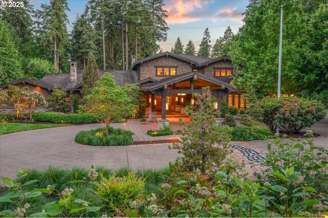 13150 SW Iron Mountain Blvd, Portland, OR 97219 - view of front of house featuring driveway
