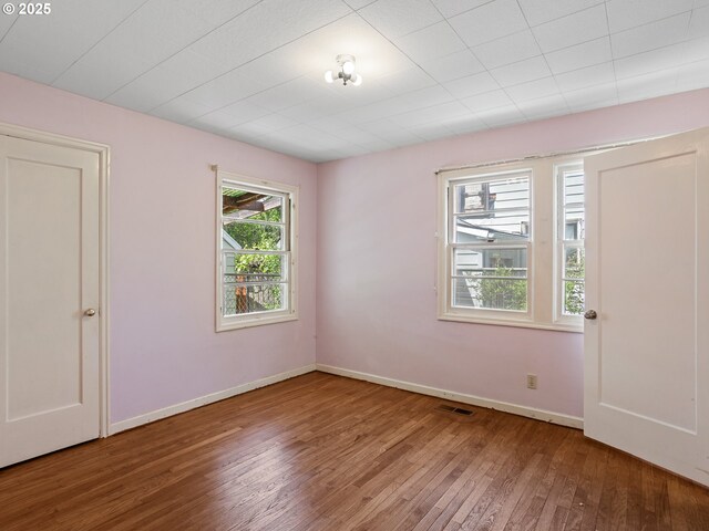 4315 SE 28th Pl, Portland, OR 97202 - spare room featuring hardwood / wood-style flooring and baseboards