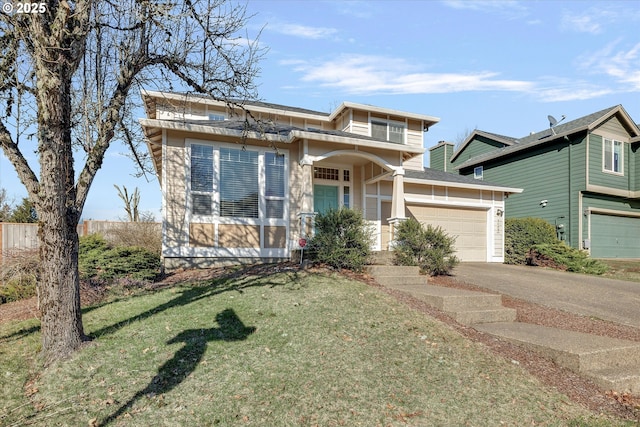 view of front of home with a garage, driveway, and a front yard