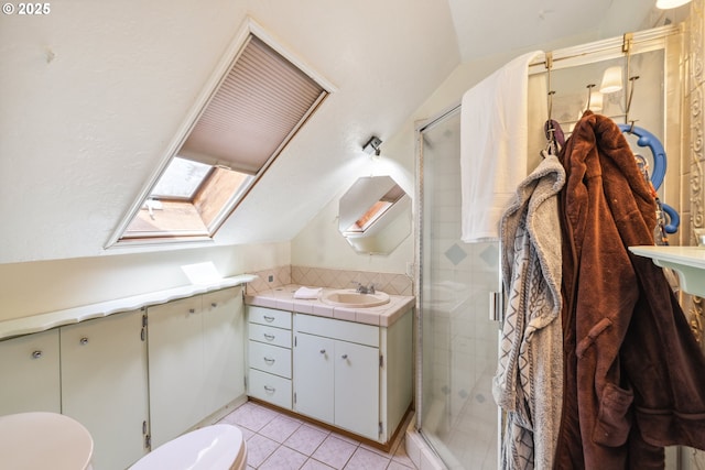 28272 S Hult Rd, Beavercreek, OR 97004 - bathroom featuring lofted ceiling, a skylight, a stall shower, toilet, and vanity