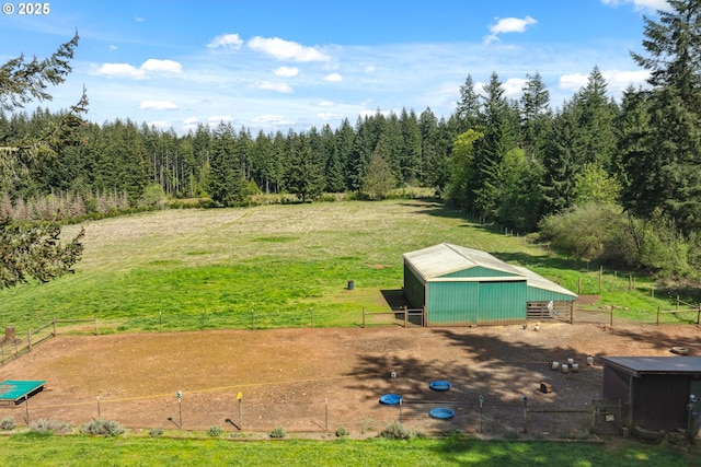 28272 S Hult Rd, Beavercreek, OR 97004 - view of yard featuring an outbuilding, a pole building, an exterior structure, and a view of trees