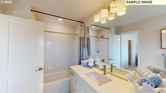 bathroom featuring vanity and shower / tub combo