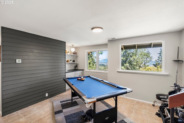 rec room with light tile patterned flooring, baseboards, and pool table