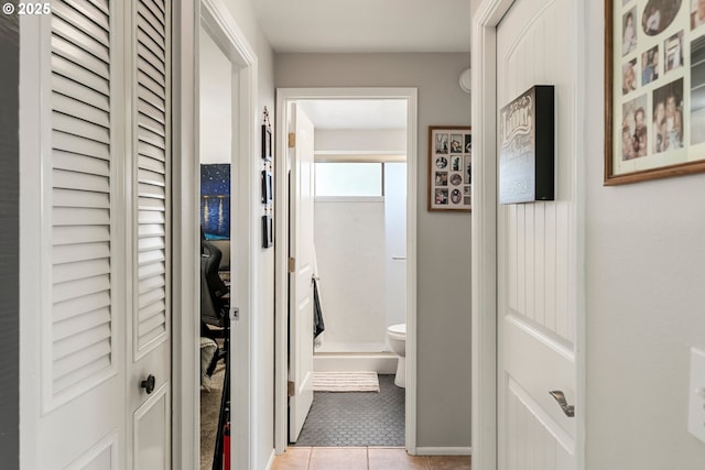 bedroom with track lighting, visible vents, a textured ceiling, and a closet