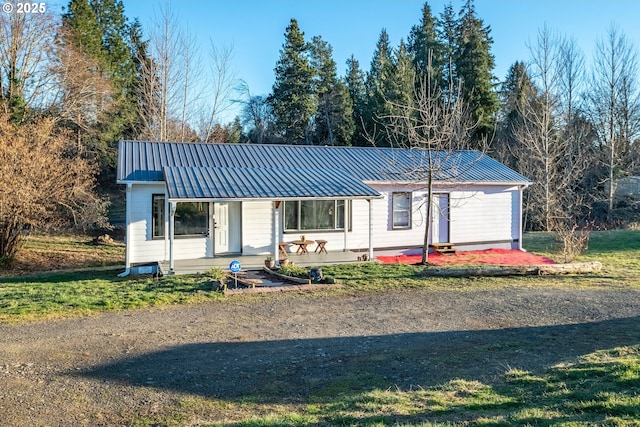 1502 Columbia St, Cathlamet, WA 98612 - view of front of property featuring metal roof and a front lawn