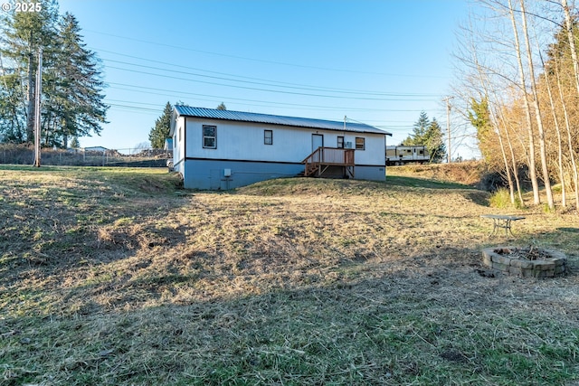 1502 Columbia St, Cathlamet, WA 98612 - view of front of house featuring an outdoor fire pit and crawl space