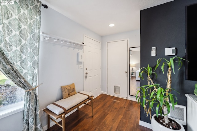 entryway featuring recessed lighting and dark wood-style flooring