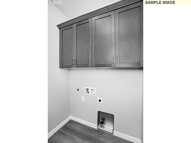 clothes washing area featuring dark wood-style flooring, baseboards, electric dryer hookup, cabinet space, and washer hookup