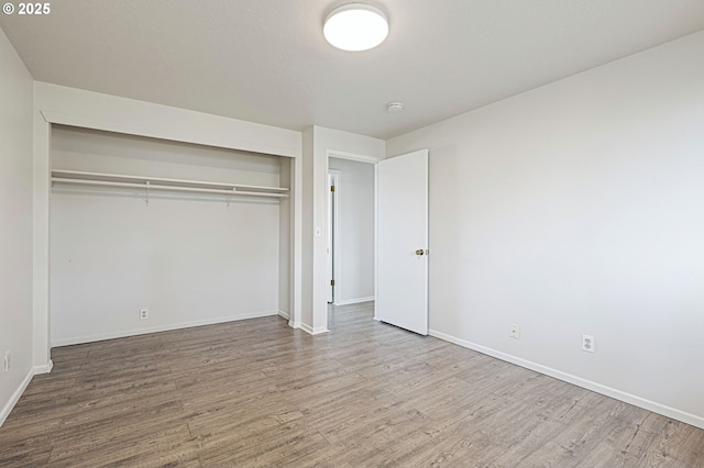 881 S Linden St, Cornelius, OR 97113 - unfurnished bedroom with wood finished floors and a closet