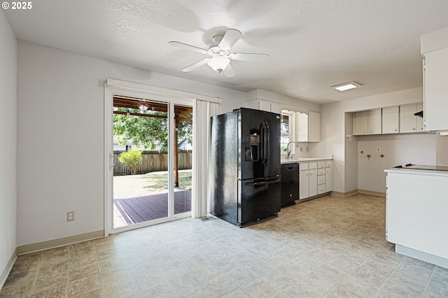 881 S Linden St, Cornelius, OR 97113 - kitchen featuring black appliances, ceiling fan, light countertops, a textured ceiling, and white cabinets