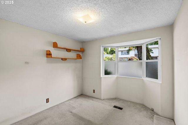 233 SE Paloma Ave, Gresham, OR 97080 - empty room with carpet and a textured ceiling
