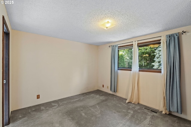 233 SE Paloma Ave, Gresham, OR 97080 - empty room featuring a textured ceiling and carpet floors