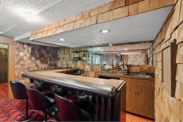 233 SE Paloma Ave, Gresham, OR 97080 - indoor wet bar featuring a textured ceiling and wooden walls
