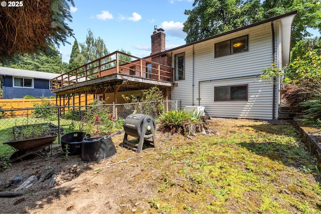 233 SE Paloma Ave, Gresham, OR 97080 - back of property featuring a chimney and a wooden deck