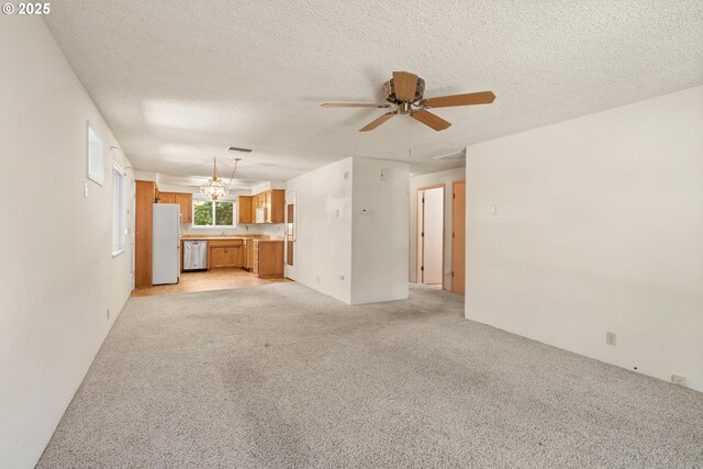 713 Brookside Cir, Rogue River, OR 97537 - unfurnished living room with ceiling fan, light carpet, and a textured ceiling